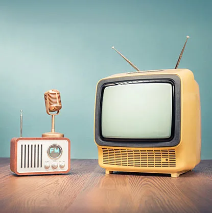 Designers working on traditional ad creatives for legal marketing